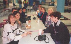 Group of attendees at a table. Left side, front to back: Darlene, Hilde, Walter, Nicole, Barb. Right side, front to back: Sharon, Christine, Anna, Marilyn A.