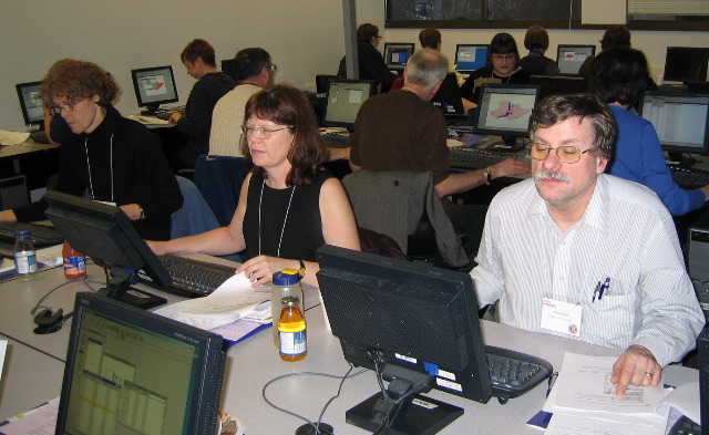 Susan, Elizabeth and Doug are deep in concentration.