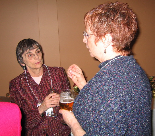 Gwen and Sharon compare notes.