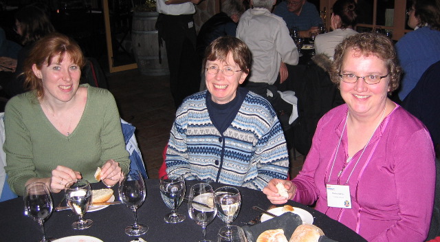 Christine, Linda and Marilyn are enjoying the entertainment.